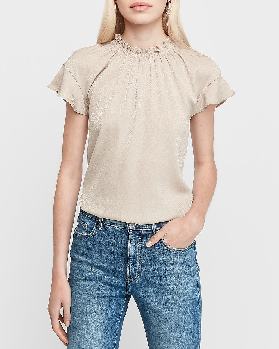 beige mock neck top