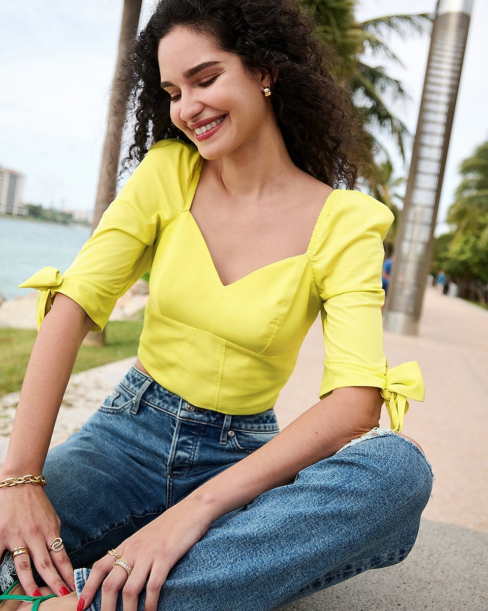 Express  Bow Puff Sleeve Corset Cropped Top in Light Yellow