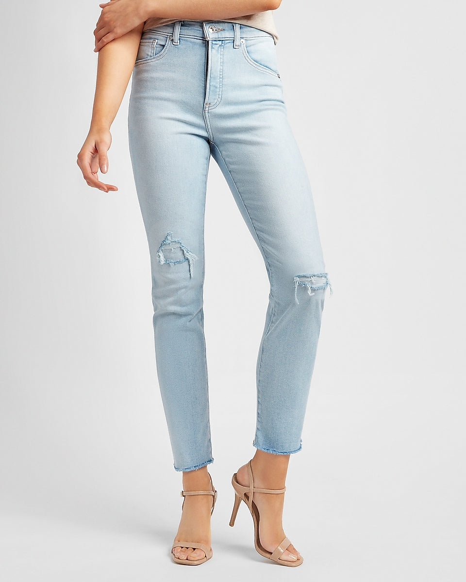 Express | High Waisted Ripped Raw Hem Slim Jeans in Light Wash ...