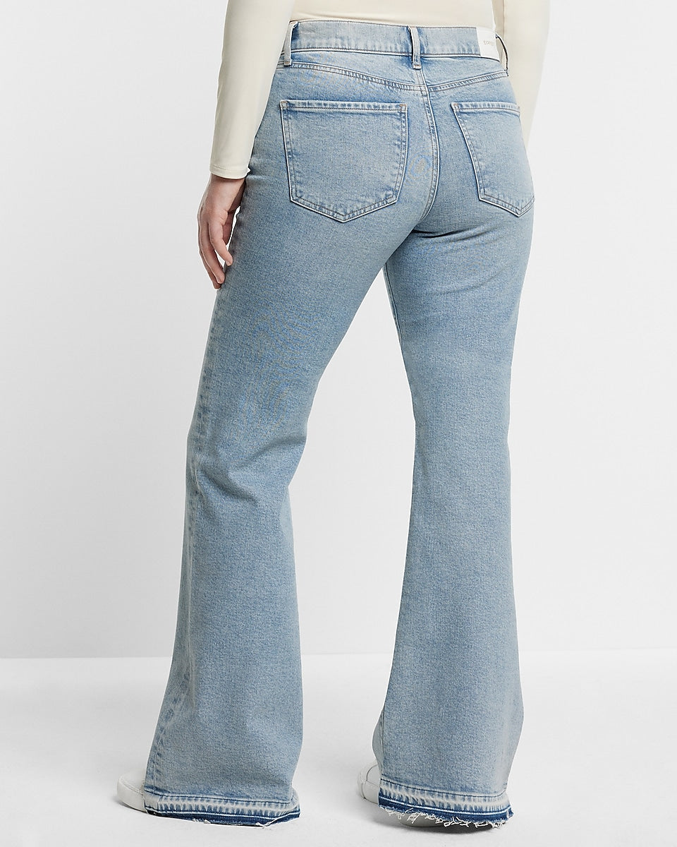 Express | Mid Rise Light Wash Ripped 70S Flare Jeans in Light Wash ...