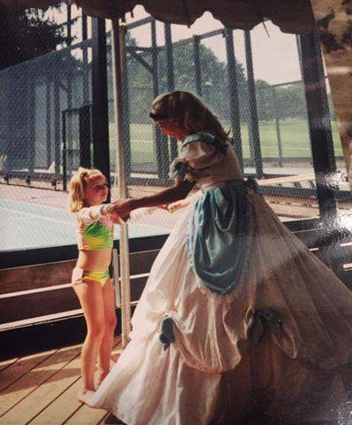 Little girl dancing with Cinderella 