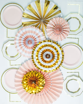 Pale pink and gold paper fans table centerpeices. White, gold, pale pink paper plates and white napkins with gold details.