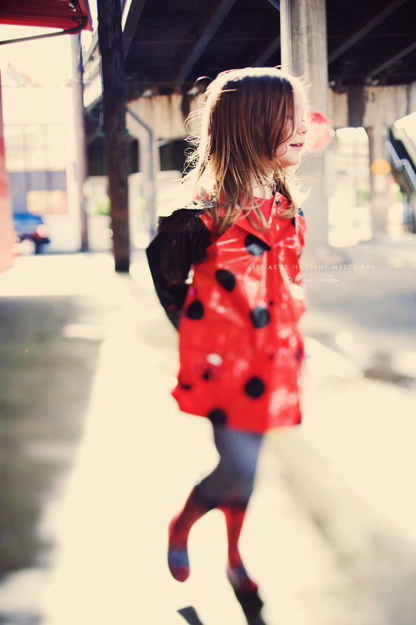 ew25-girl-in-raincoat-and-rain-boots.jpg