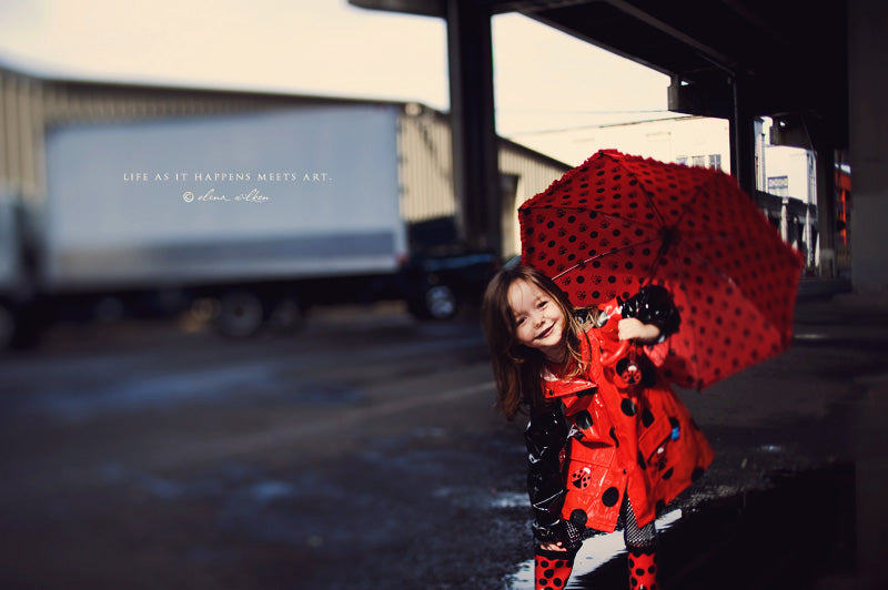 ew24-girl-in-raincoat-and-rain-boots.jpg