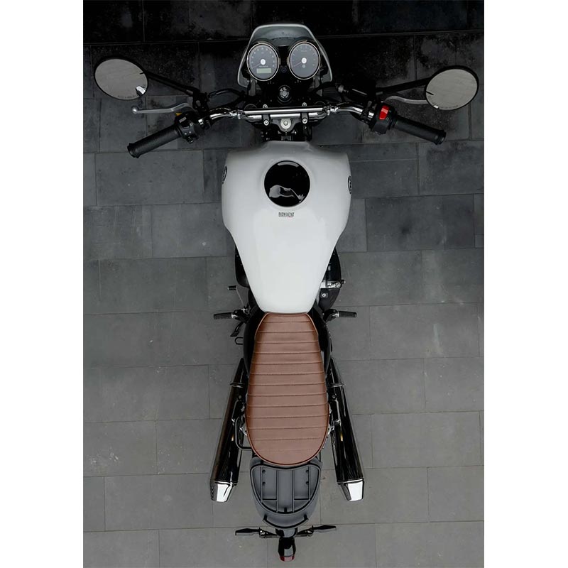 Brown scrambler mono saddle on Royal Enfield.