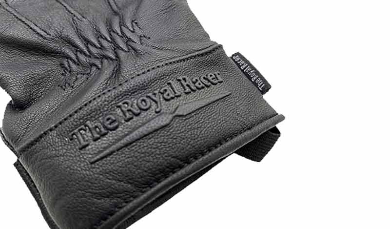 Embossed logo of The Royal Racer brand.