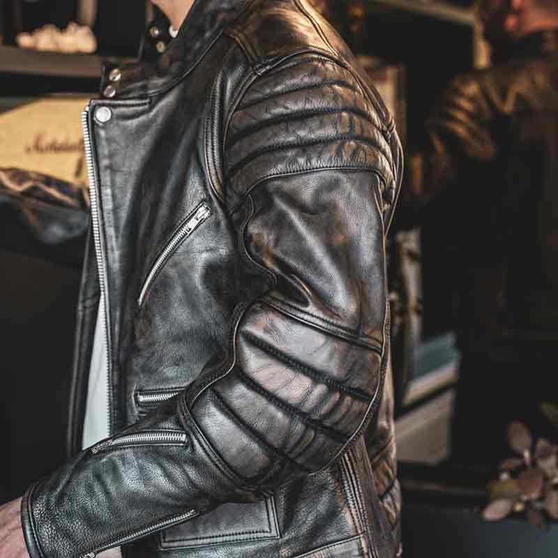 Rocker Age of Glory aged leather jacket sleeve detail.