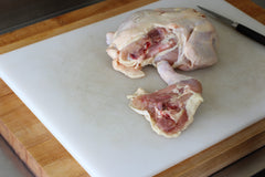 chicken leg removed from the chicken body