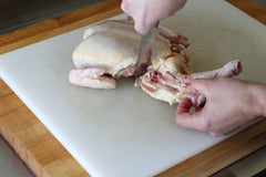 how to cut the chicken leg off the chicken body