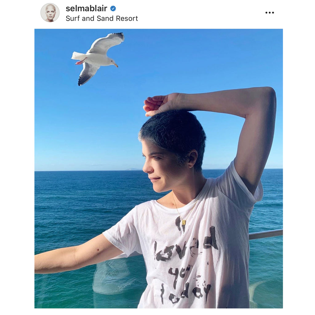 Selma Blair in the Pour l'air Scents I loved you today tshirt. A positive message reminding you to look for something to love in each day. It's wearing gratitude.