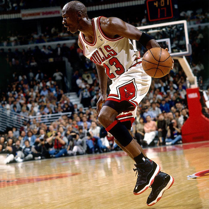 michael jordan wearing jordan 11 bred