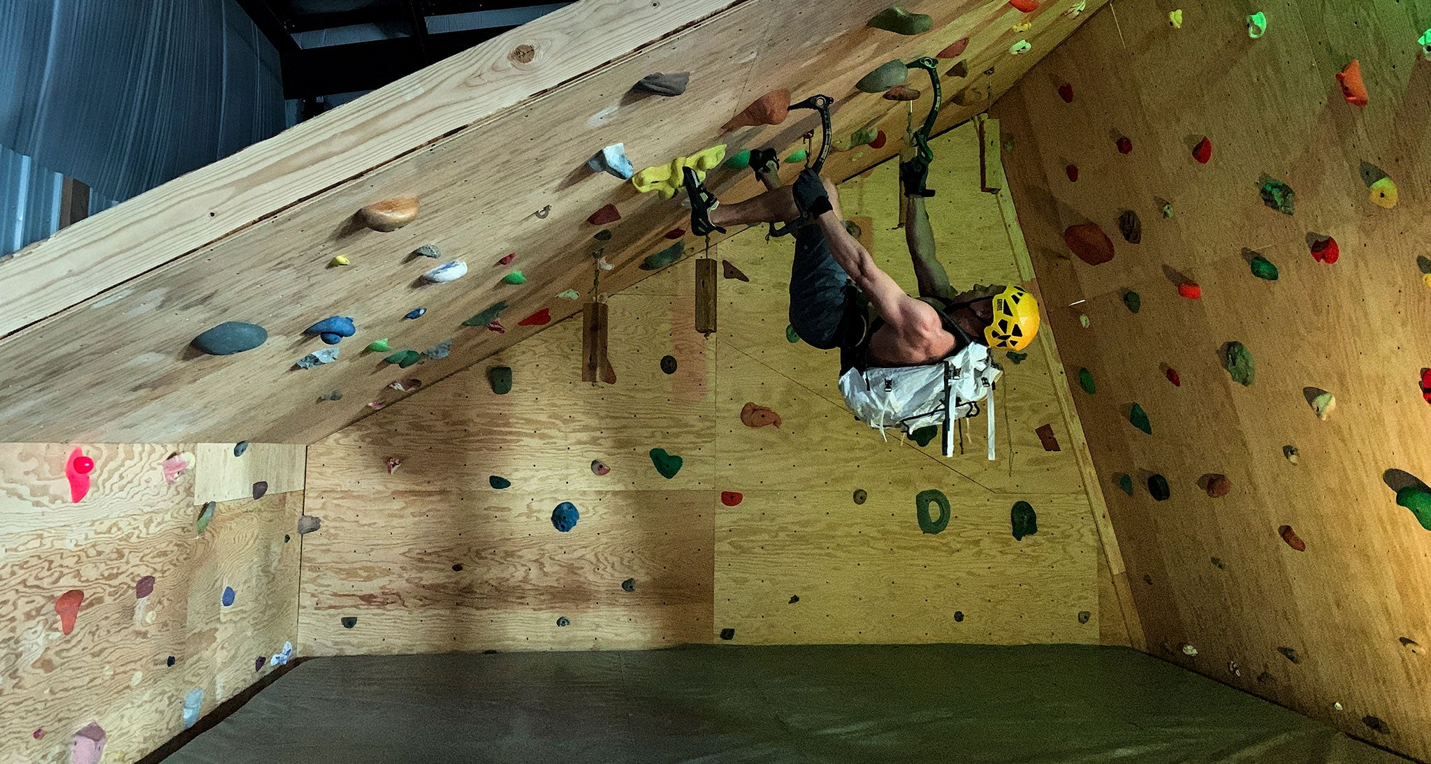 Ice climber training in indoor gym