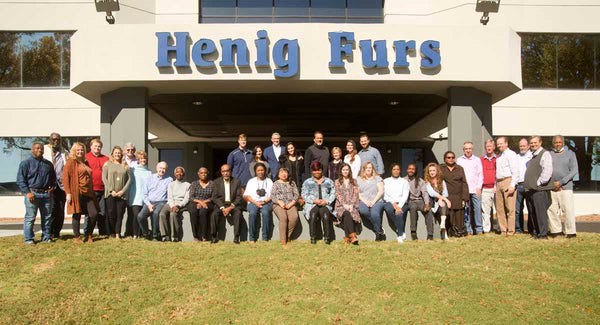 Henig Furs family & employees in front of Henig Furs Montgomery store