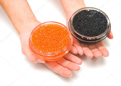 a bowl of fish roe and a bowl of caviar 