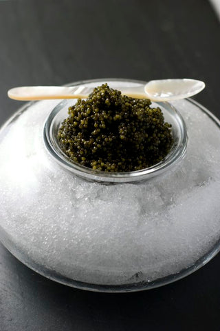 a cup of caviar on ice 