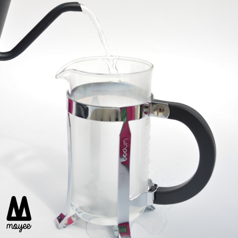 Warm up the French Press by pouring hot water into it. Empty after glass is properly heated