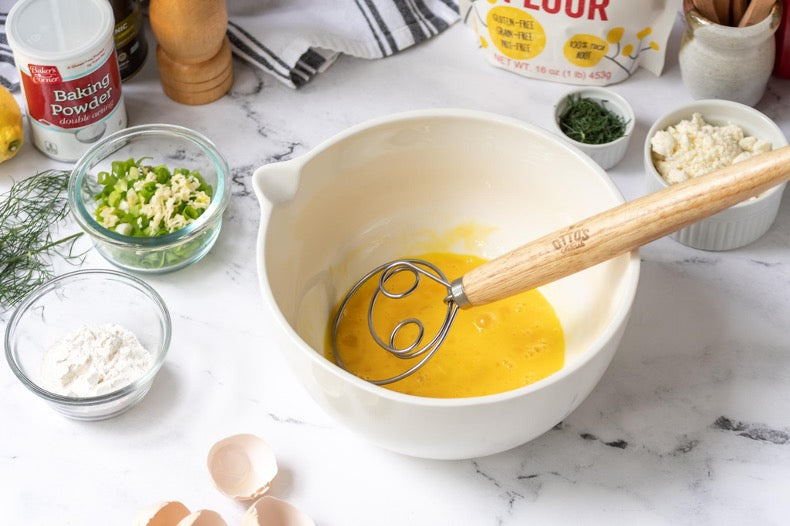 Eggs being whisked in a bowl by the Otto's Naturals Danish Whisk