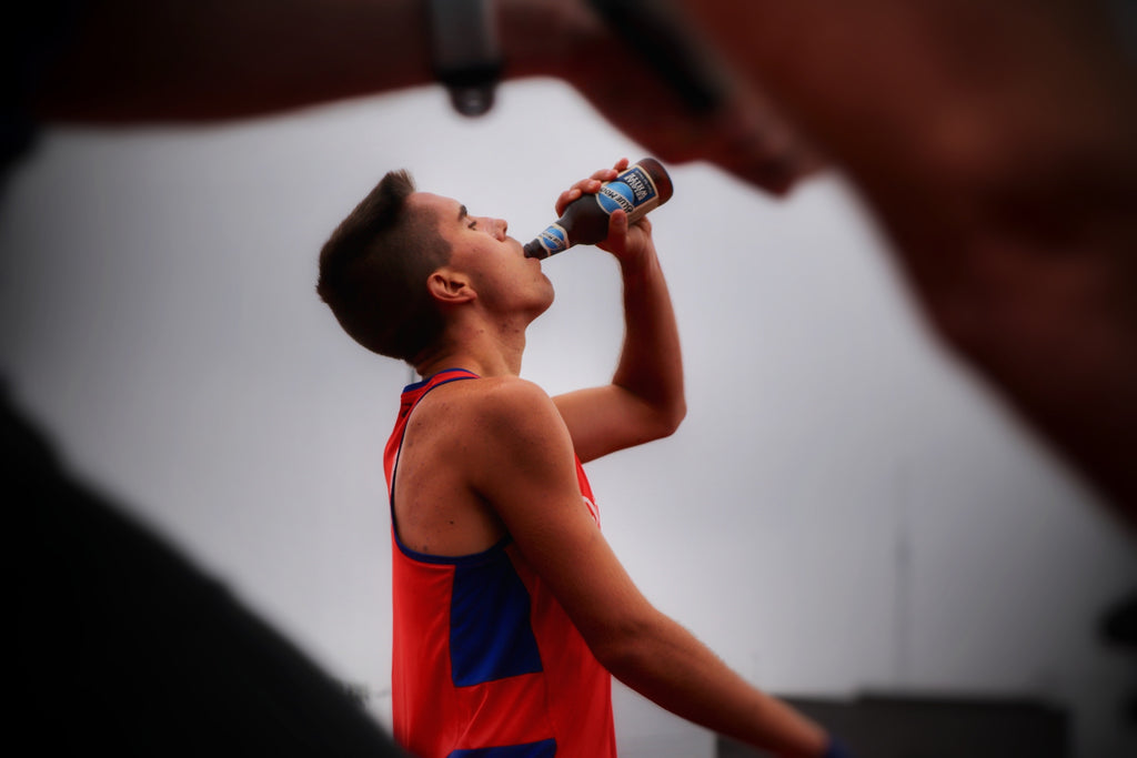 Chris Robertson Chugs Blue Moon in Beer Mile American Record
