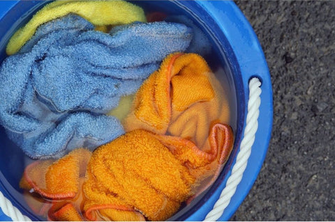 repurpose old towels into cleaning cloths