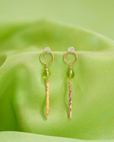 close up of peridot earrings