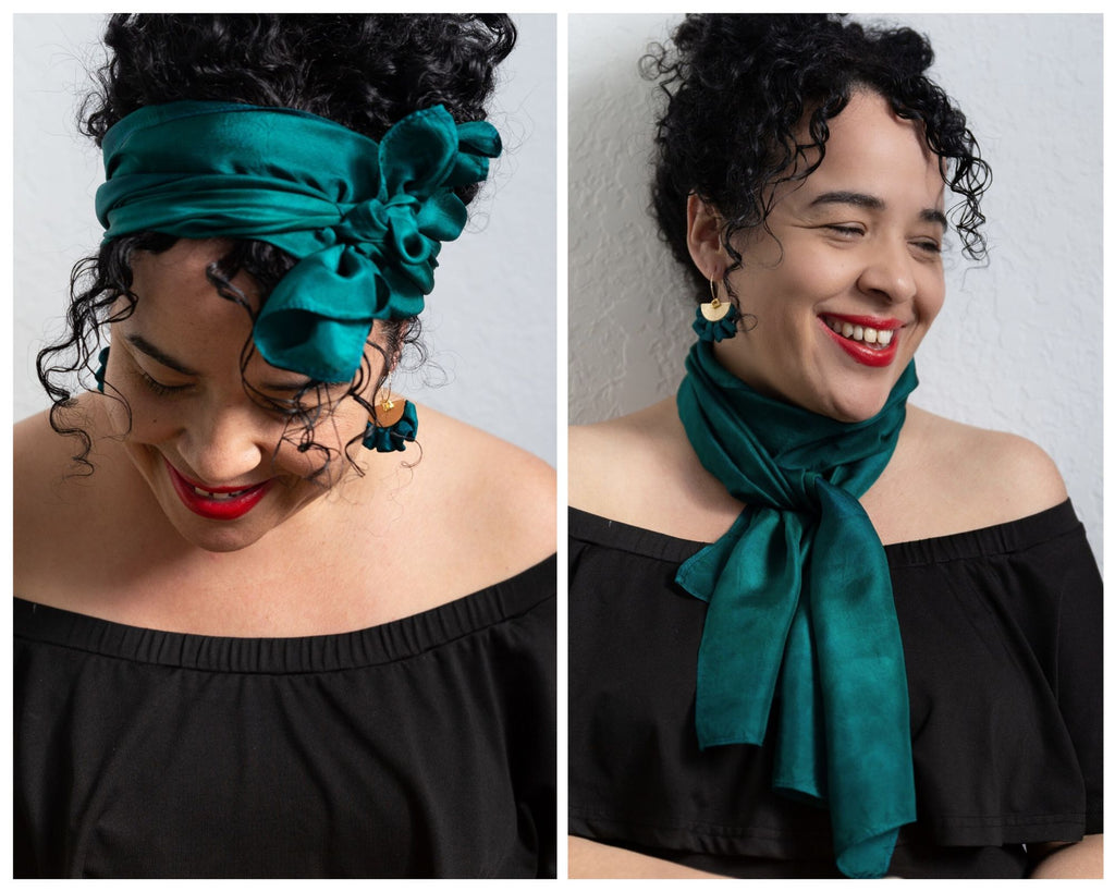 Two photos of an Afro Cubano woman with loosely coiled black hair in a high bun, wearing an off shoulder black blouse.  She has an evergreen silk scarf wraped widely around her head and tied in a ruffled knot at the top, off center in one photo and wrapped closely around her neck in the other photo.