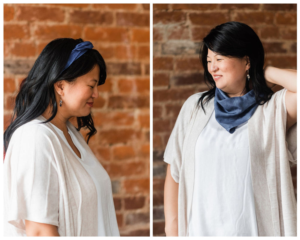 Two photos of a Chinese American woman with long black hair and bangs falling behind her shoulders.  She's wearing an oatmeal-colored short sleeve sweater over a white blouse.  She's wearing a midnight blue silk bandana as a headband in one photo, and tied around her neck in a triangle in the other photo.