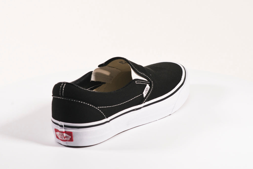 black canvas shoes vans