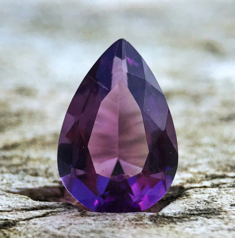 Teardrop shaped amethyst gemstone