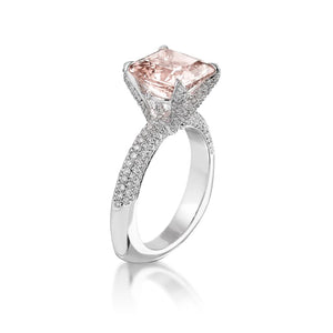 Famous singer jewelry, JLo wore an  emerald-cut pink diamond engagement ring