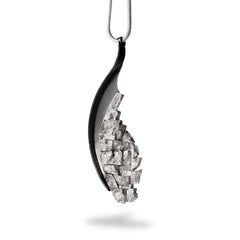 Pendant necklace made by Rebecca Zink is made of sterling silver and steel.