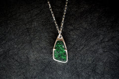 One-of-a-kind silver gemstone necklace with a vertical green uvarovite gemstone