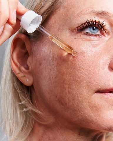 Woman using retinol