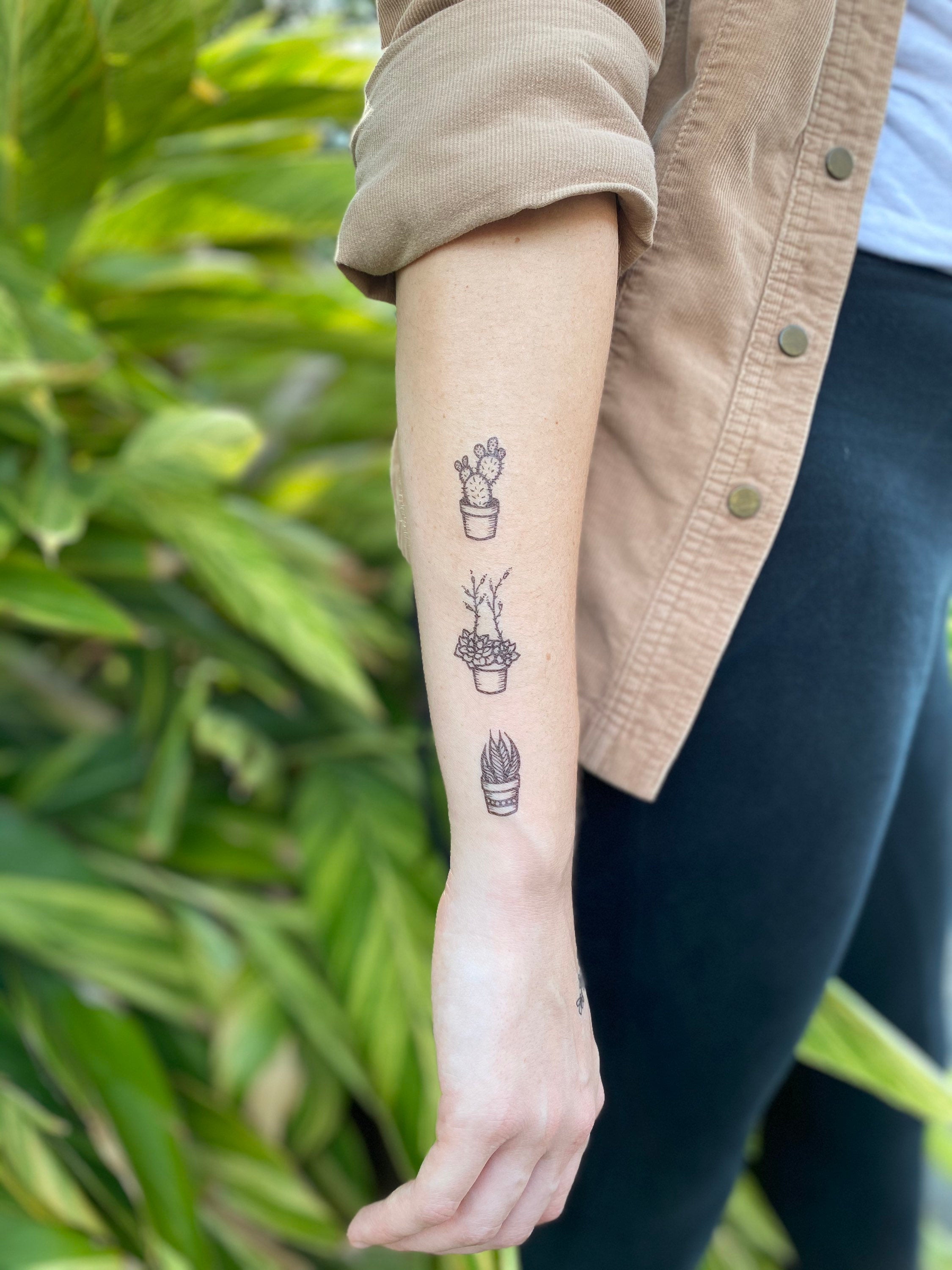 Premium AI Image  A tattoo of a succulent and leaves