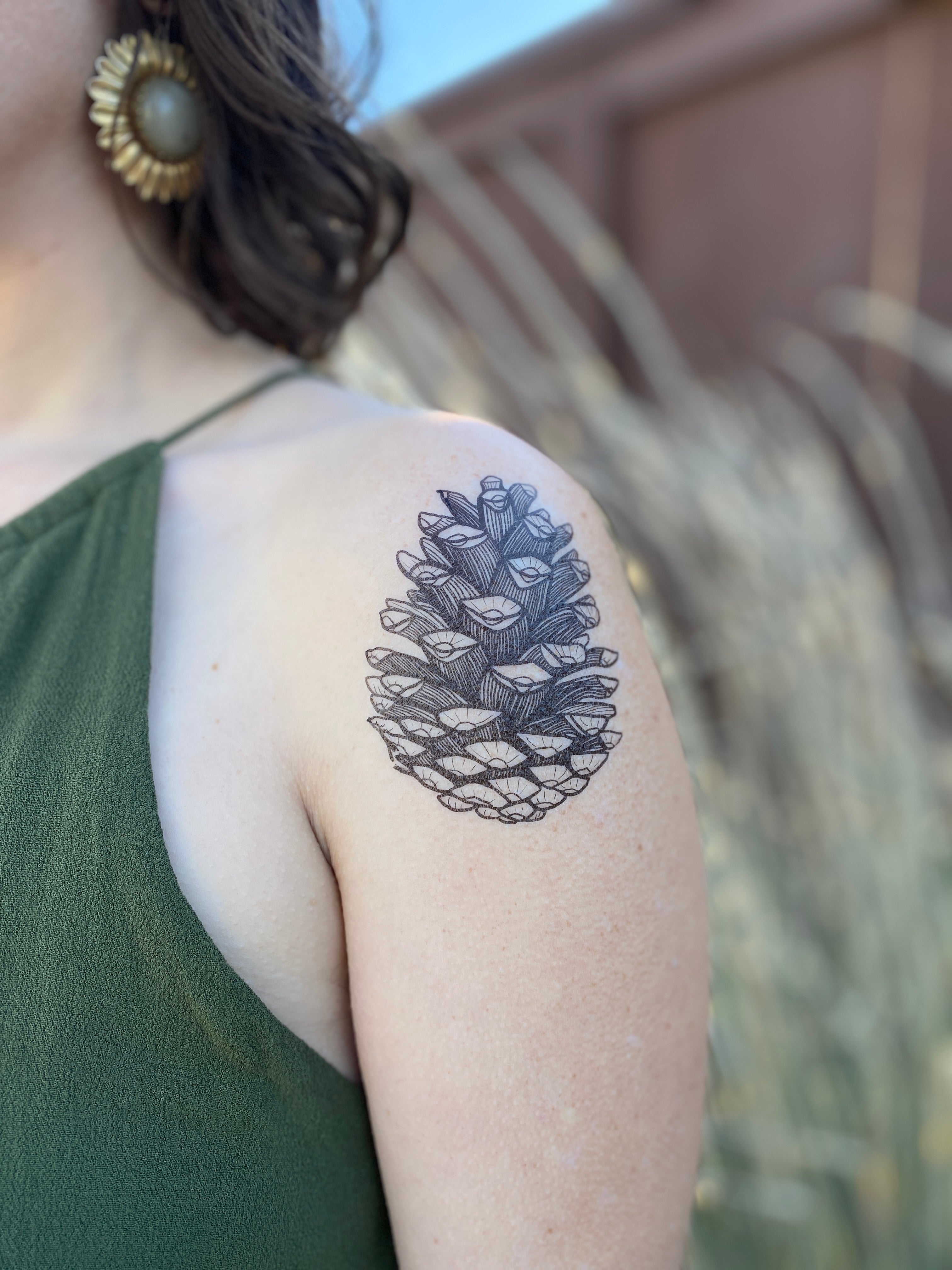 mini pine cone tattooTikTok Search