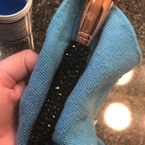 step by step guide on how to clean makeup brushes