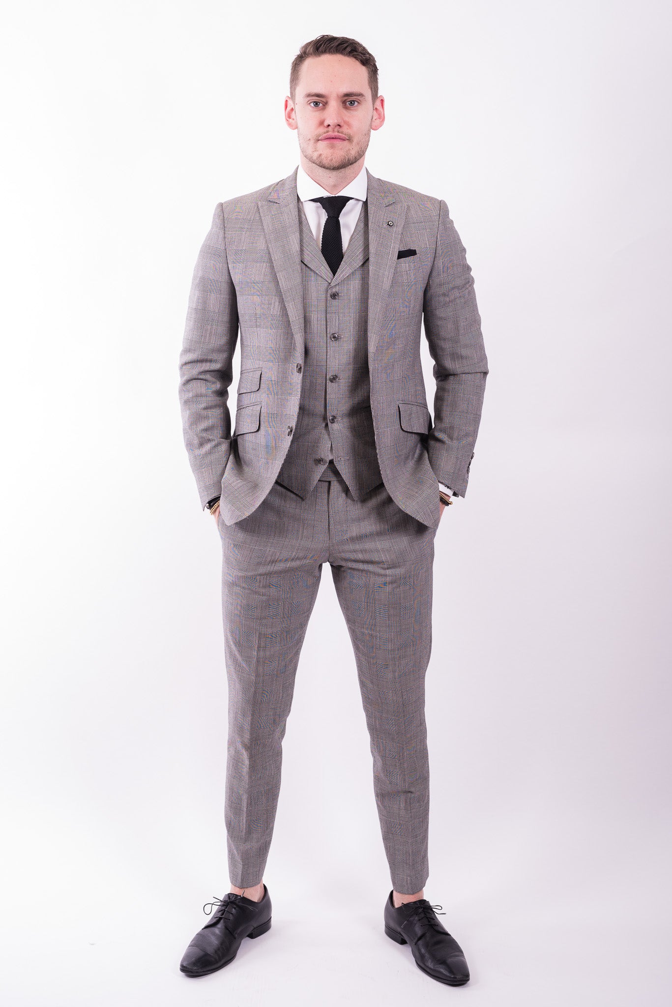 custom three piece grey flannel suit from Ticknors