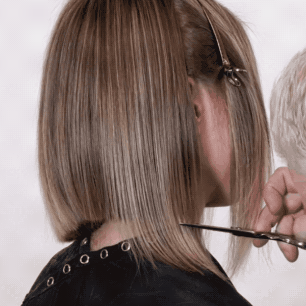 Cutting the perimeter of a bob with texturizing shears