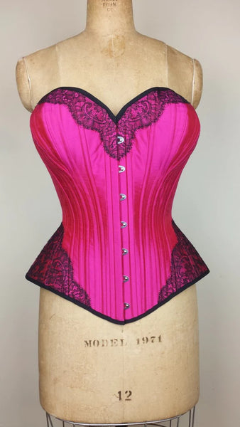 Angela Friedman custom corsetry: a bright pink silk overbust corset for a full bust client