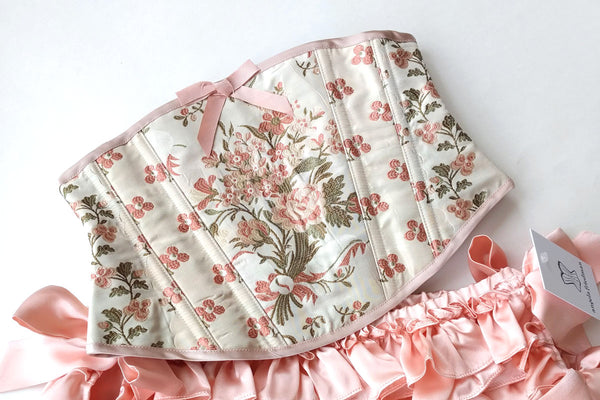 Brocade corset with pink flowers and silk ruffled panties