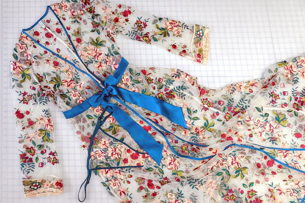 Bespoke floral dressing gown with blue silk trim and flower embroidery