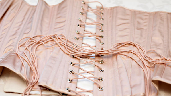 Pink silk corset by luxury corsetiere Angela Friedman