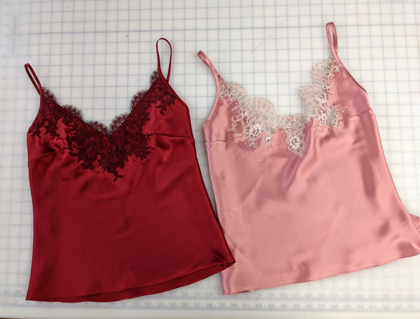 Custom silk camisoles in pink and red with French lace applique