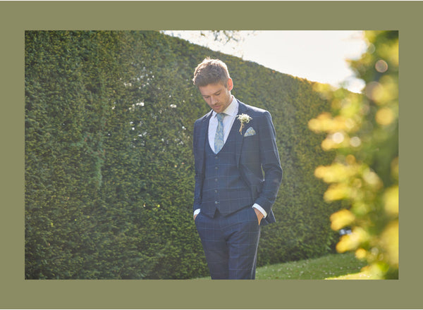 Men's check suits from Marc Darcy