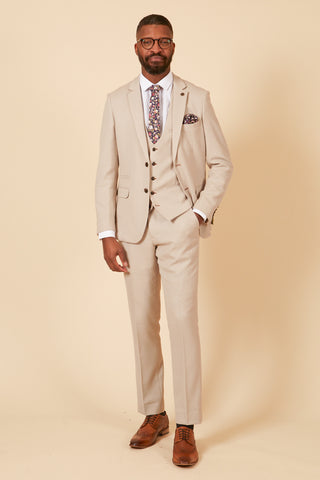 Men's cream wedding suits from Marc Darcy