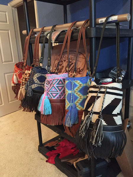 Leather and twill bucket bags with leather fringe