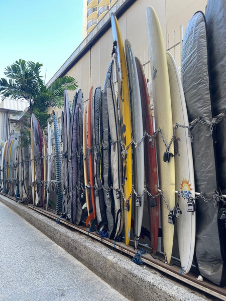 Love this sight of all these surfboards parked, ready to go - Hawaii!
