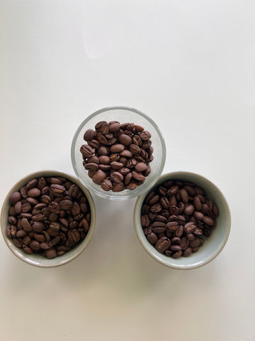 pic of three different types of roasted coffee - medium, medium-dark and dark