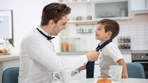 father and son using silk neckties