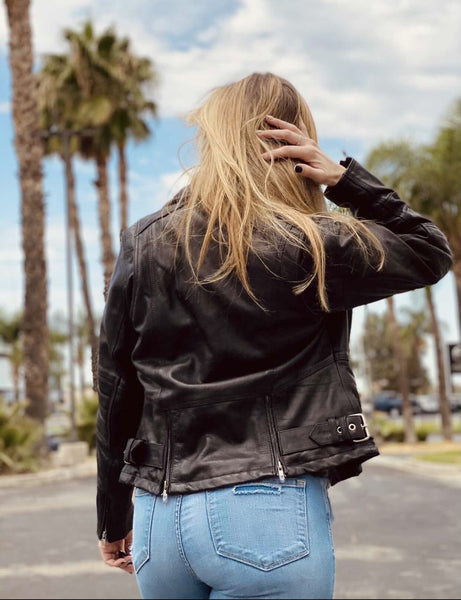 Woman wearing Daniel Smart Mfg. lightweight leather motorcycle jacket showing back