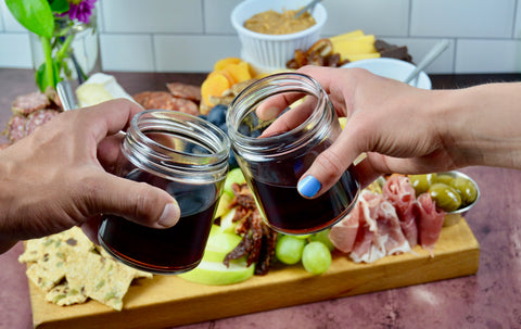 All-natural peanut butter and almond butter. Charcuterie board for mother's day. Party favorites for Mother's Day 2022. Cured meats, cheeses, dried fruit, fresh fruit.